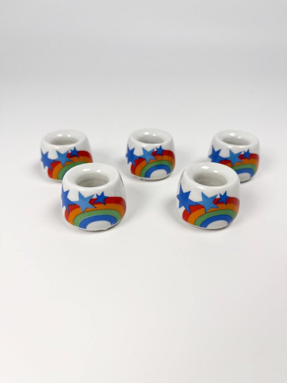 Vintage set of 5 mini rainbow and star ceramic candleholders